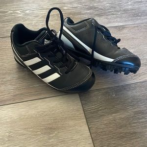 Blck and white adidas cleats